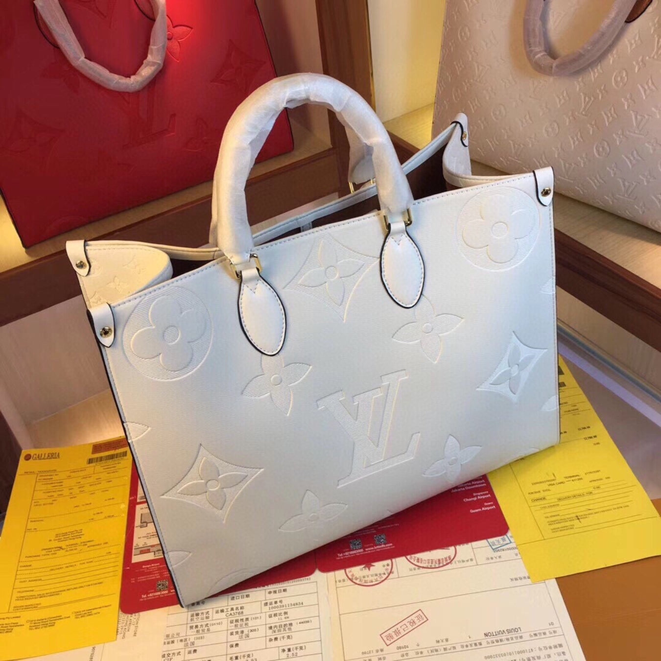 Bolsa LV On The Go Couro Branco 41cm grande