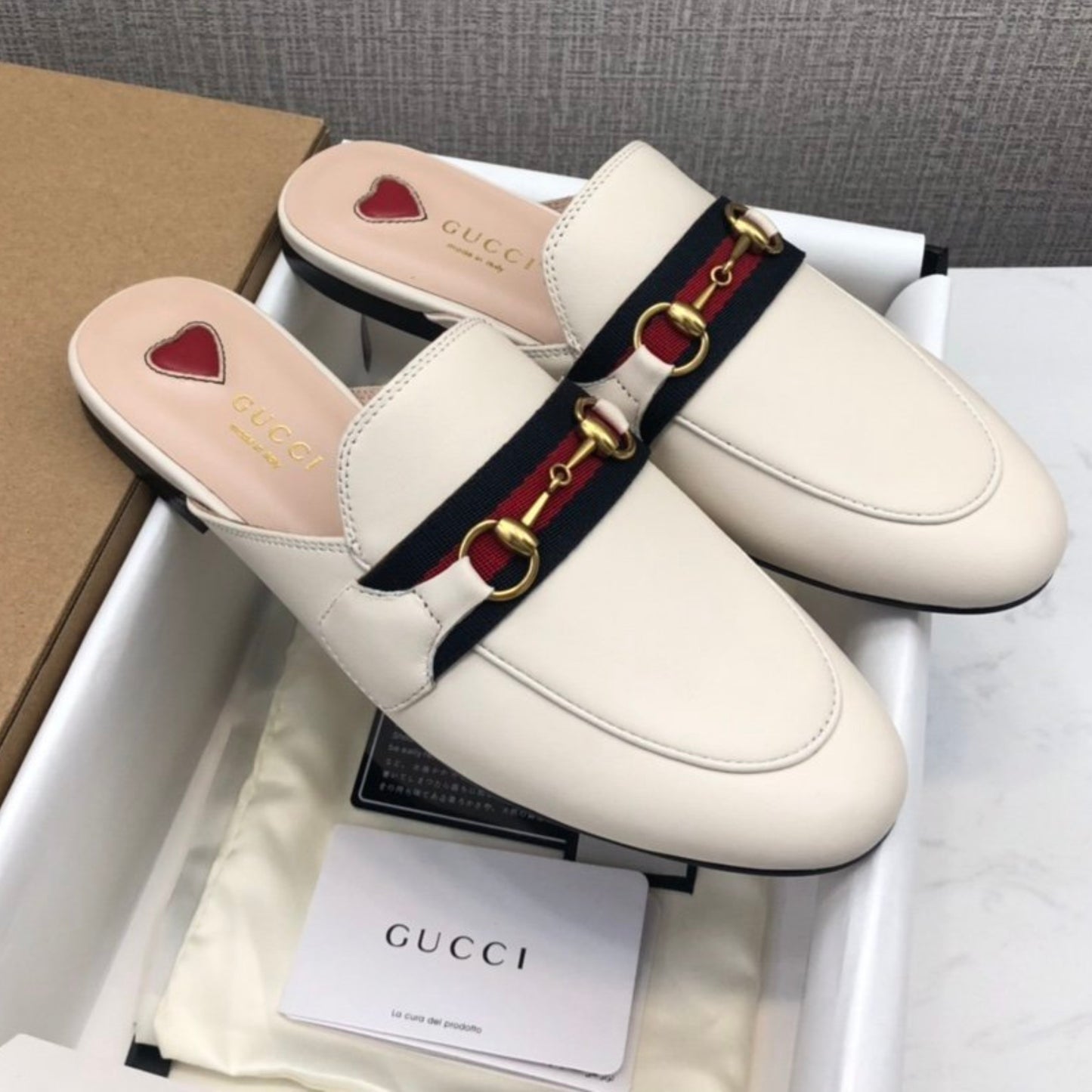 Mule GG Princetown de couro Off White com Faixa