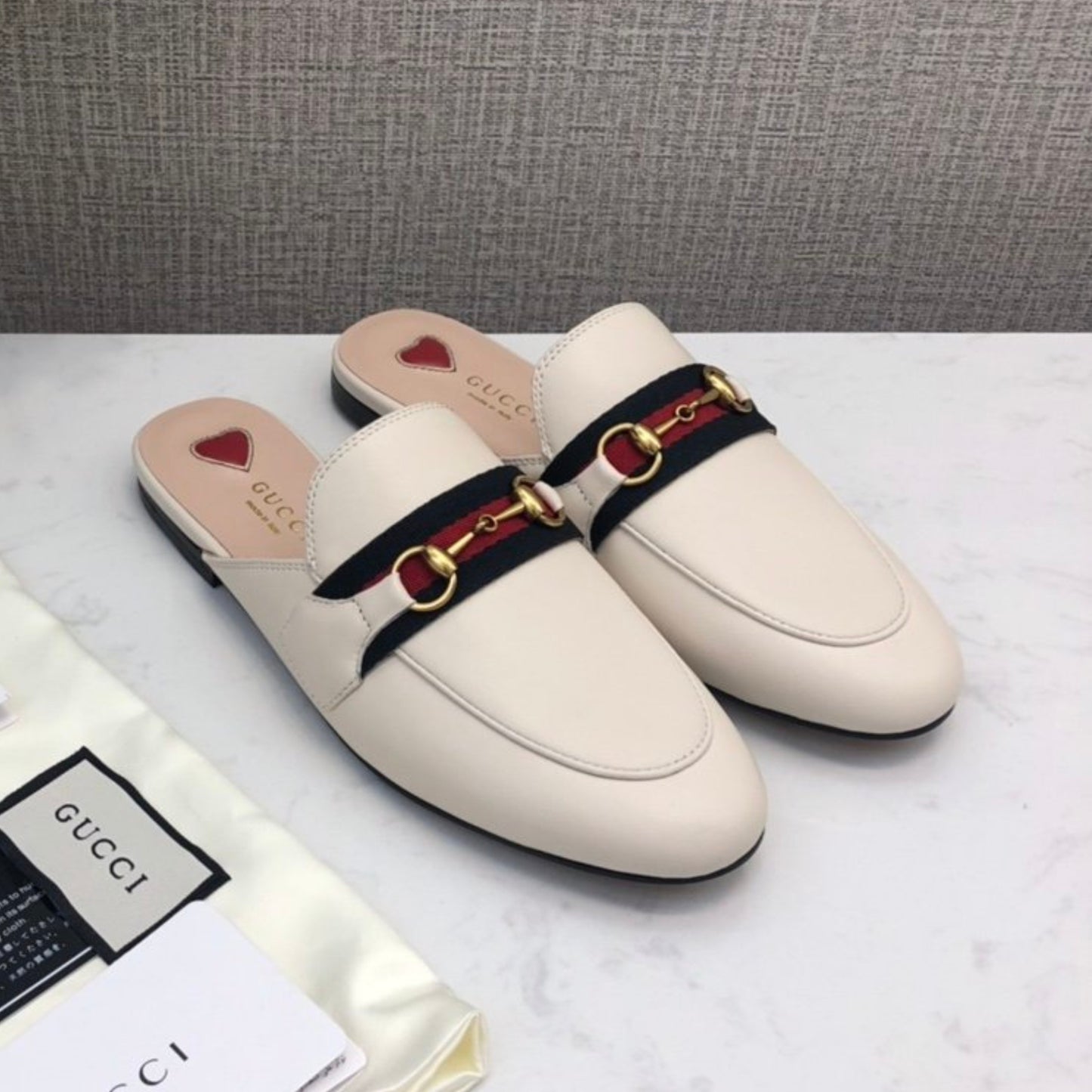 Mule GG Princetown de couro Off White com Faixa