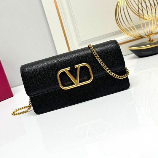 Bolsa VLTN VLogo Preto com dourado 22cm
