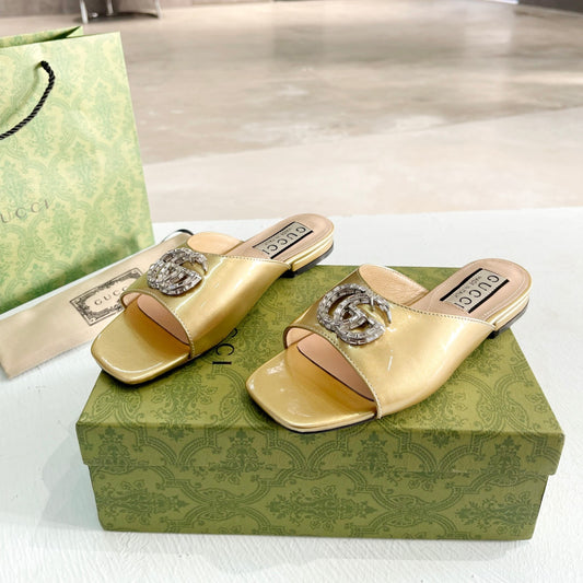 Sandália GG flat com Double GG Dourada